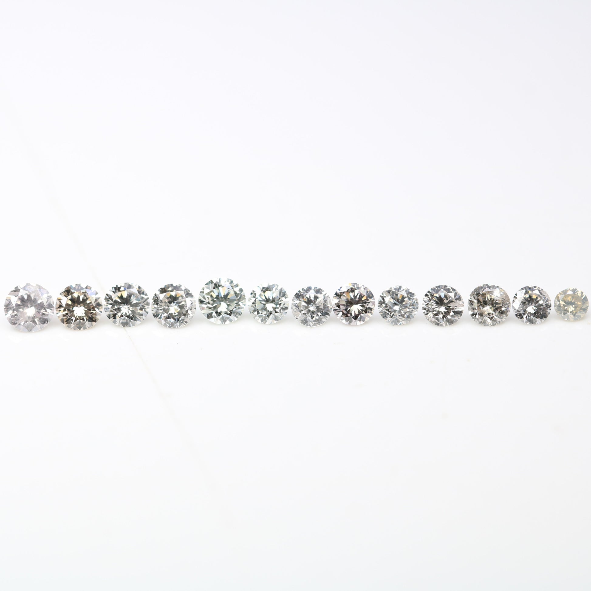 0.61 CT Round Brilliant Cut Light Mix Diamonds (1.70 to 2.60 MM) for an Elegant Engagement Ring: Unique Gemstone Collection - JayKrishna Diamond
