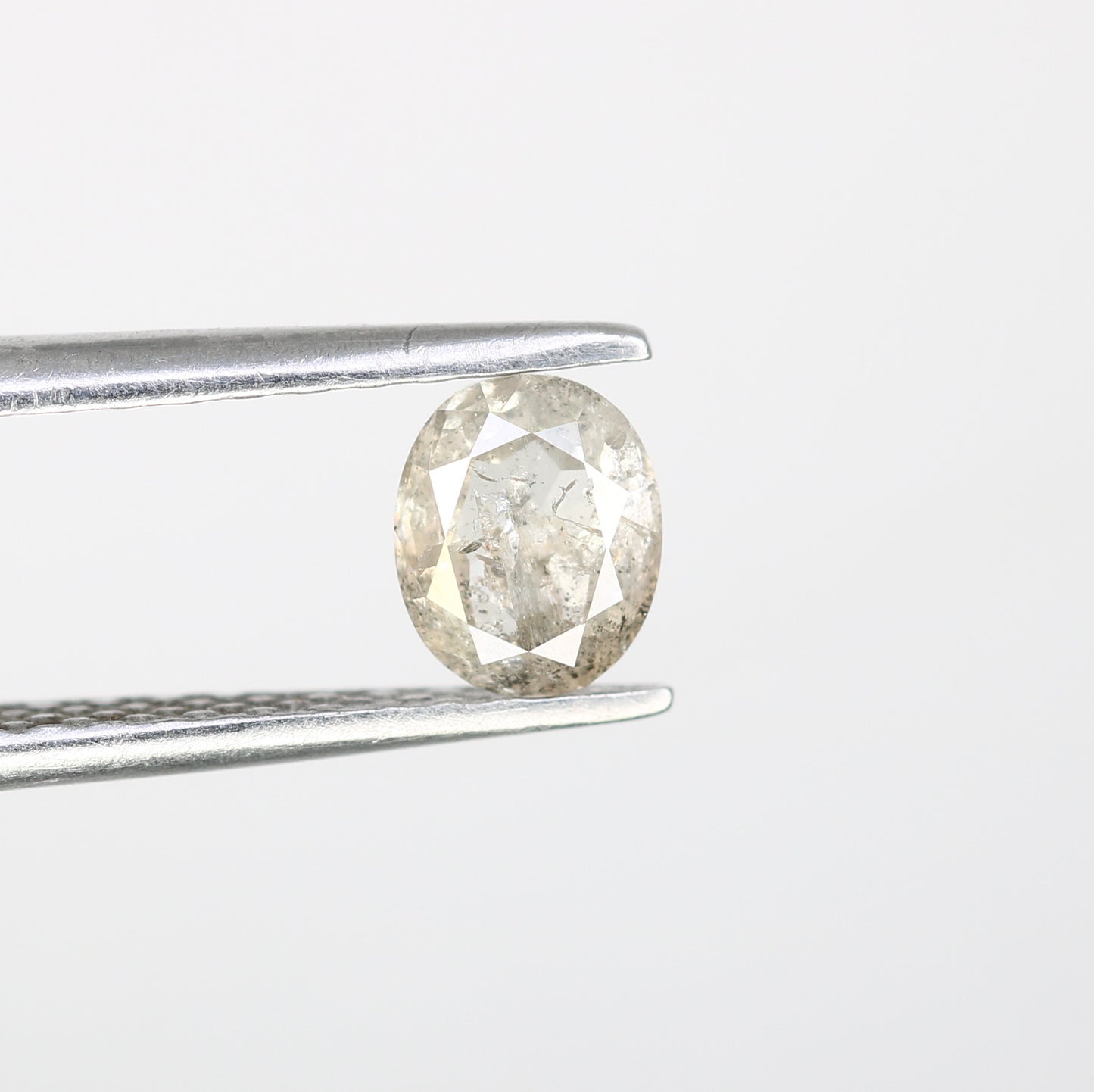 0.68 CT Oval Shaped 5.60 MM Natural Loose Salt And Pepper Diamond For Engagement Ring - JayKrishna Diamond
