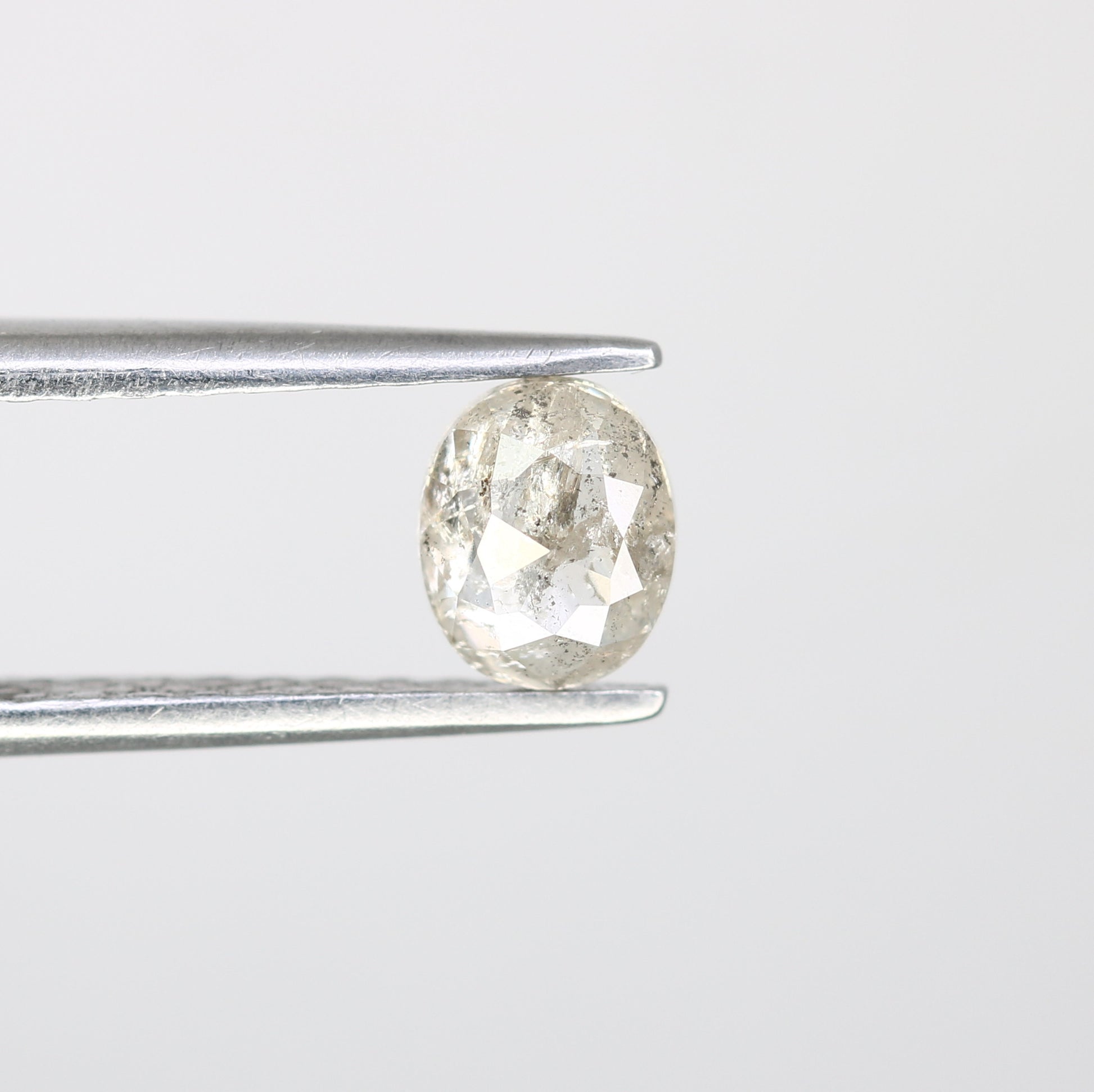 0.68 CT Oval Shaped 5.60 MM Natural Loose Salt And Pepper Diamond For Engagement Ring - JayKrishna Diamond