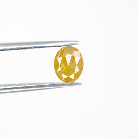 0.62 CT Fancy Yellow Oval Shape Loose Diamond (5.50 MM) for a Stunning Wedding Ring: Distinctive Gemstone Jewelry Piece - JayKrishna Diamond