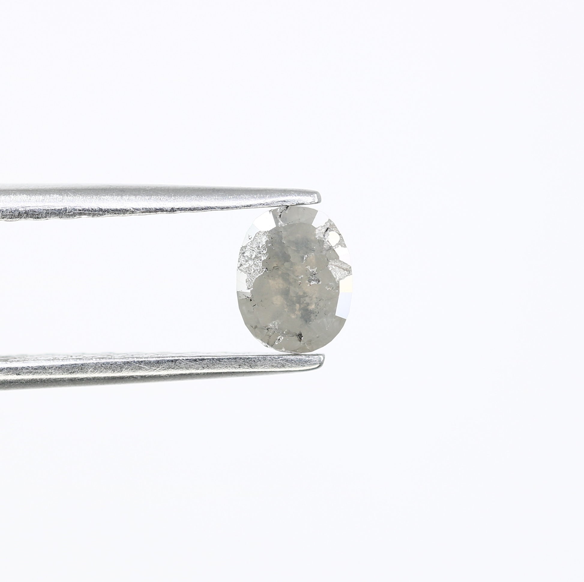 0.62 CT Oval Cut Grey Natural Diamond for a Timeless Engagement Ring: Distinctive Gemstone Jewelry Selection - JayKrishna Diamond