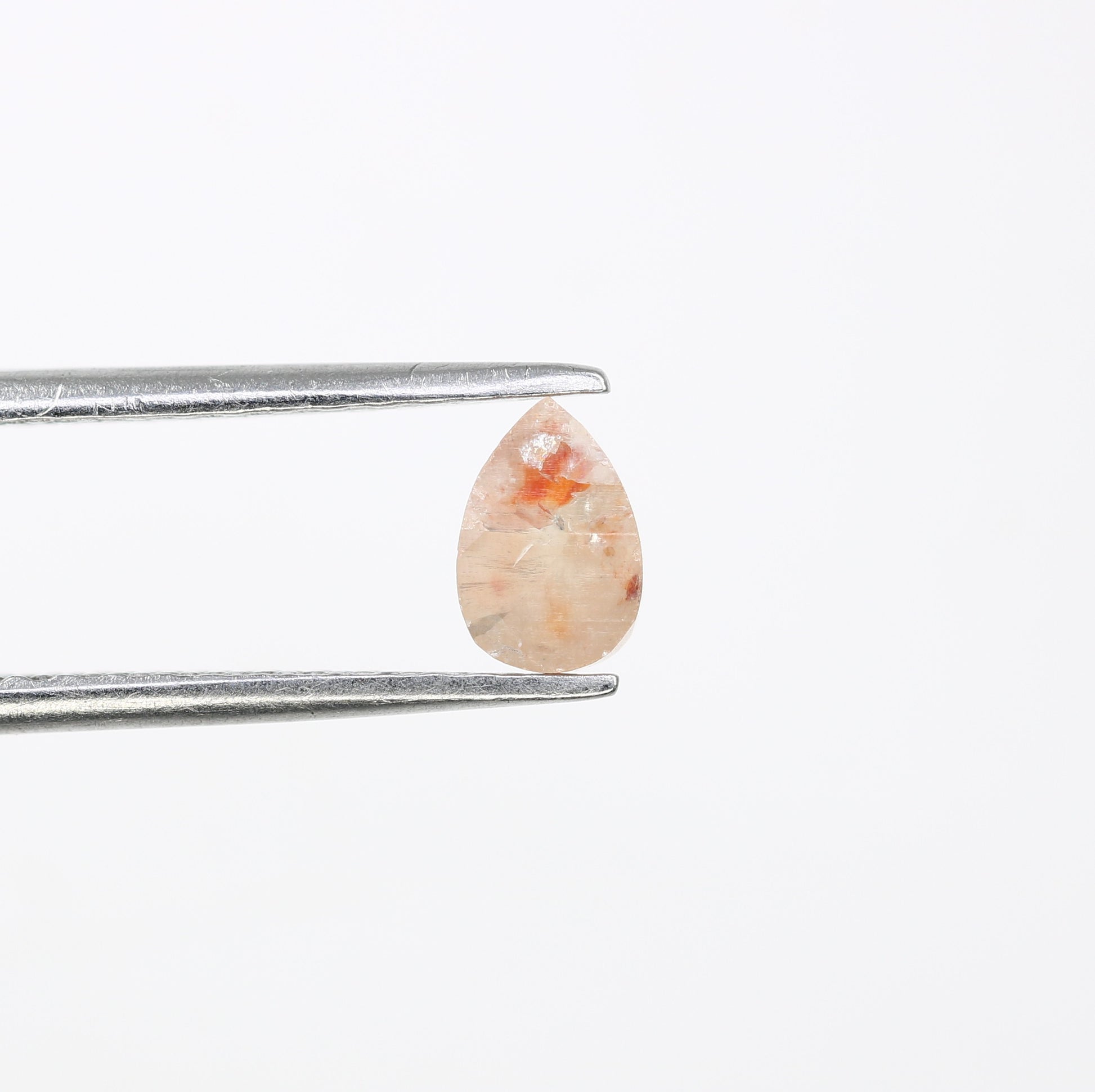 0.60 CT Natural Peach Pear Cut Diamond for a Stunning Engagement Ring: Unique Gemstone Jewelry - JayKrishna Diamond