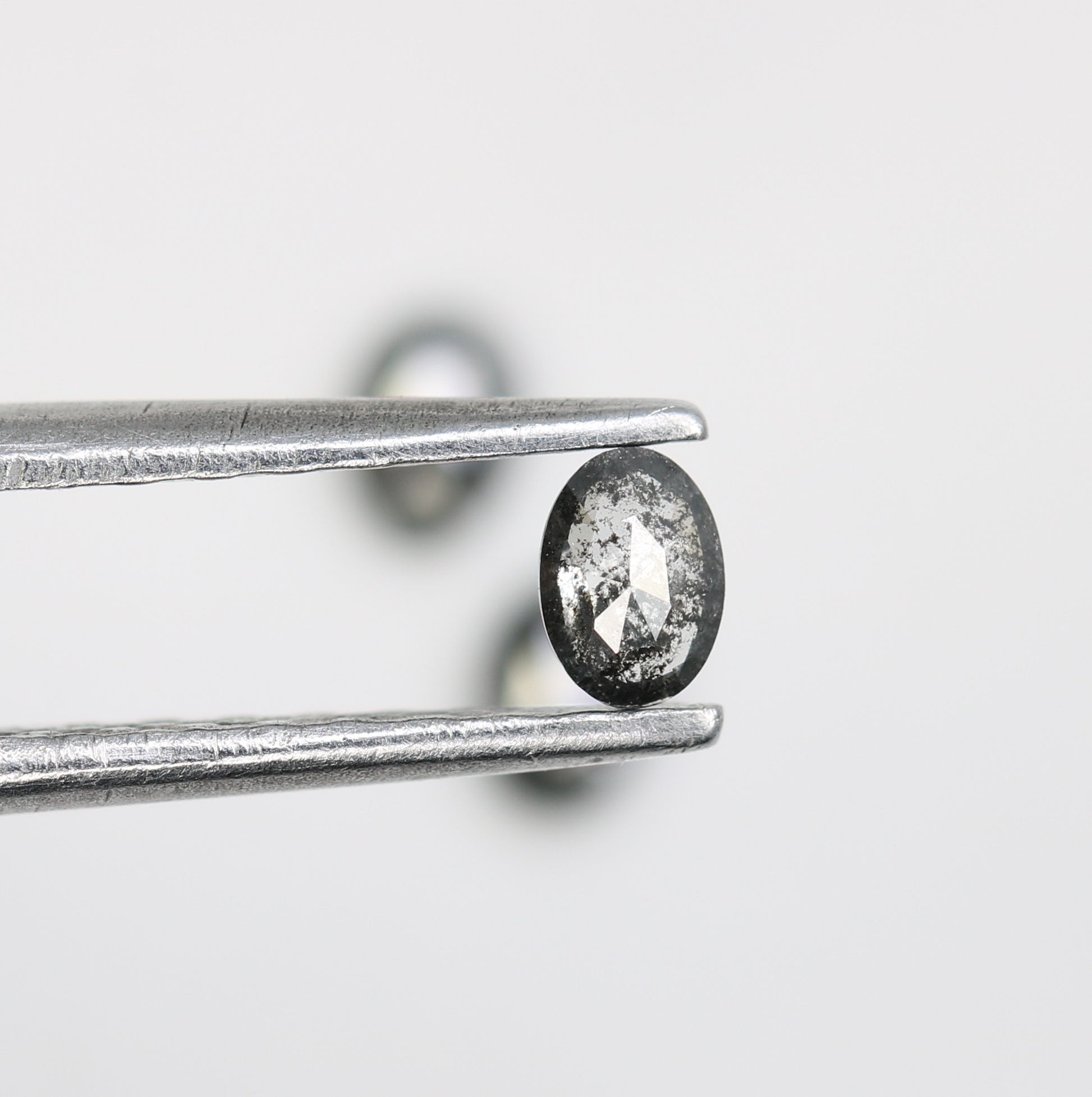 0.38 CT Salt and Pepper Oval Cut Loose Diamond for Custom Engagement Rings, Unique Bridal Jewelry & Ethical Fine Jewelry   2/2       Was this response better or worse?  Better  Worse  Same - JayKrishna Diamond