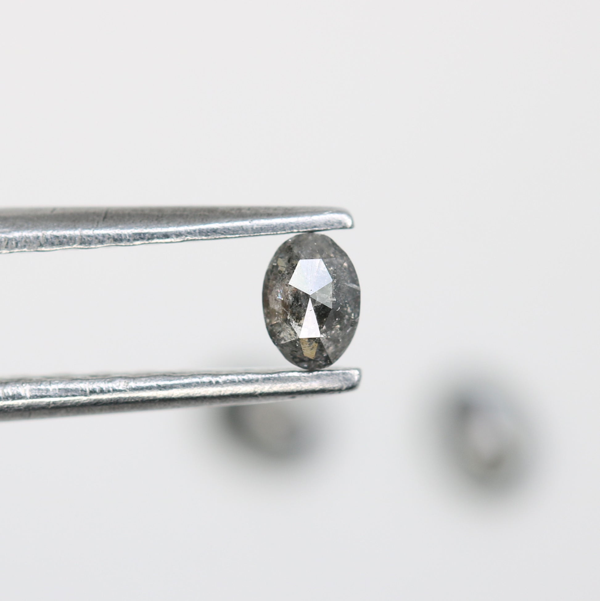 0.38 CT Salt and Pepper Oval Cut Loose Diamond for Custom Engagement Rings, Unique Bridal Jewelry & Ethical Fine Jewelry   2/2       Was this response better or worse?  Better  Worse  Same - JayKrishna Diamond
