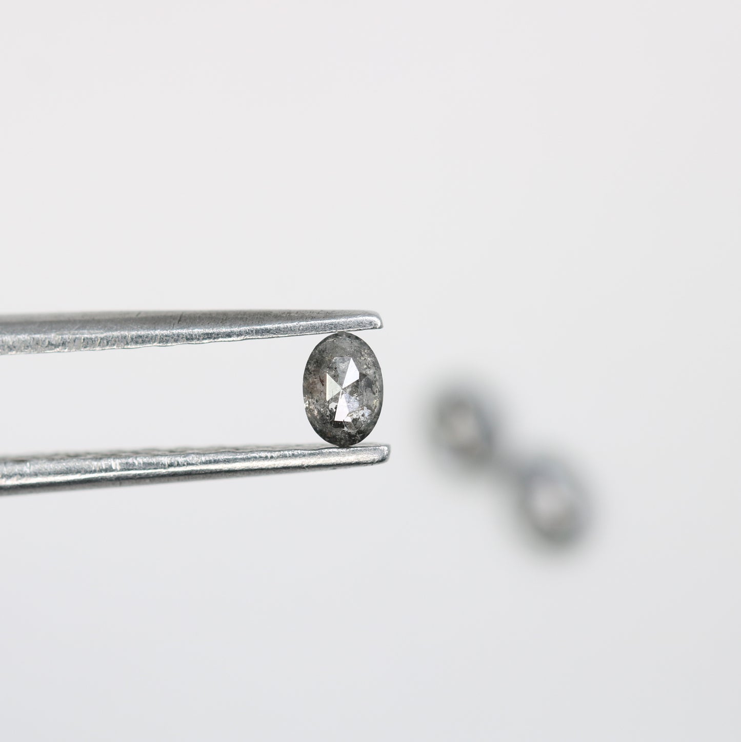 0.38 CT Salt and Pepper Oval Cut Loose Diamond for Custom Engagement Rings, Unique Bridal Jewelry & Ethical Fine Jewelry   2/2       Was this response better or worse?  Better  Worse  Same - JayKrishna Diamond