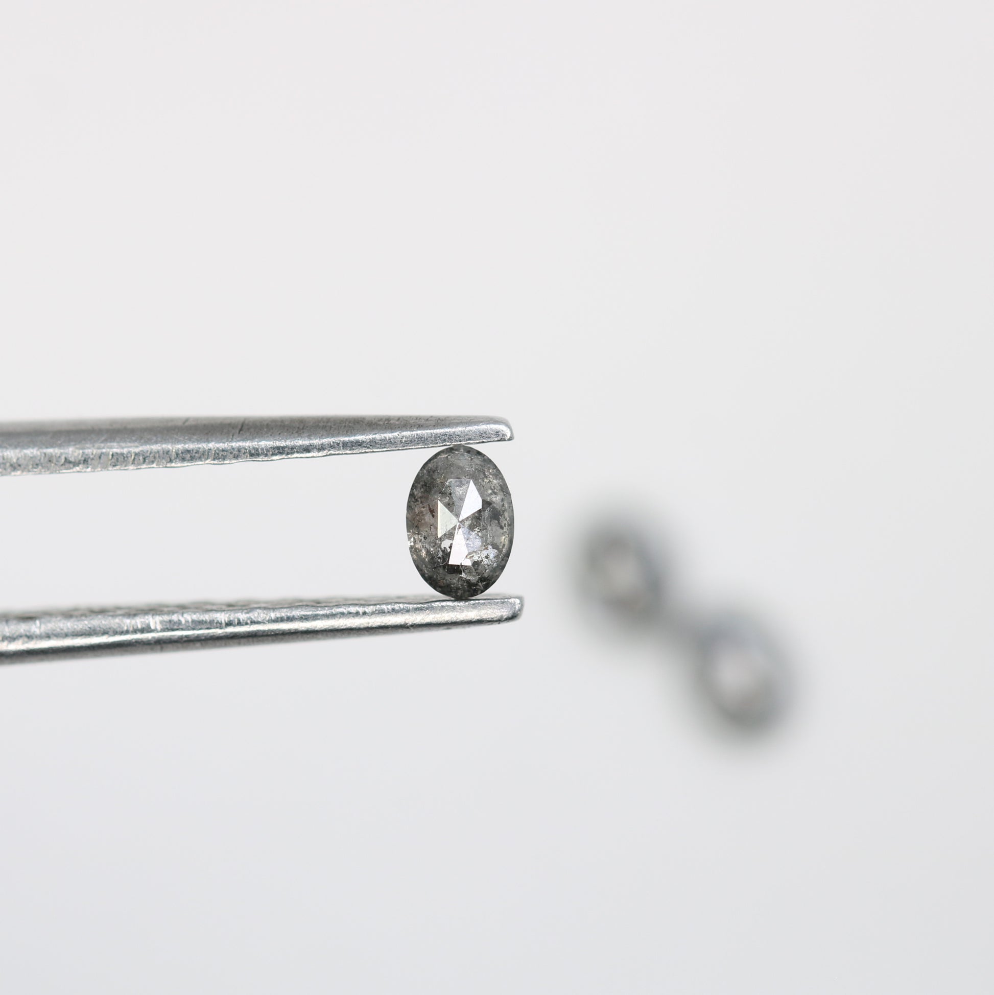 0.38 CT Salt and Pepper Oval Cut Loose Diamond for Custom Engagement Rings, Unique Bridal Jewelry & Ethical Fine Jewelry   2/2       Was this response better or worse?  Better  Worse  Same - JayKrishna Diamond