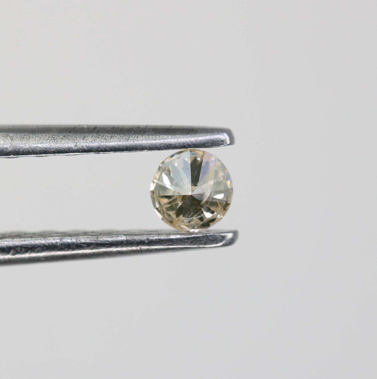 0.09 CT Natural Light Yellow Round Brilliant Cut Salt and Pepper Diamond for Custom Engagement Rings & Unique Jewelry - JayKrishna Diamond