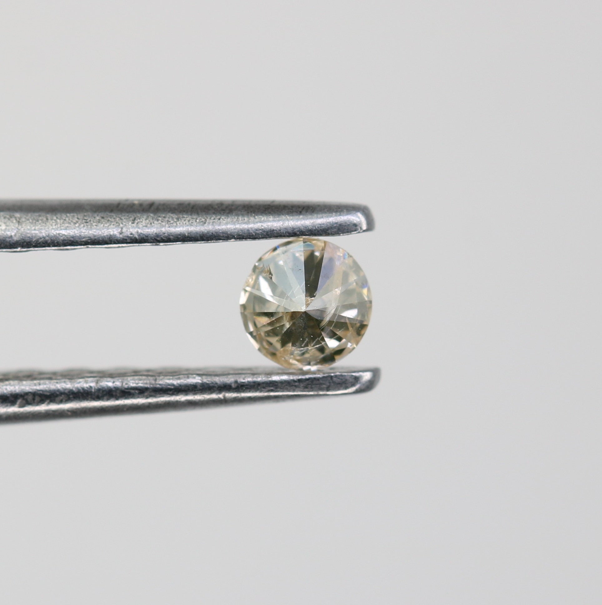 0.09 CT Natural Light Yellow Round Brilliant Cut Salt and Pepper Diamond for Custom Engagement Rings & Unique Jewelry - JayKrishna Diamond