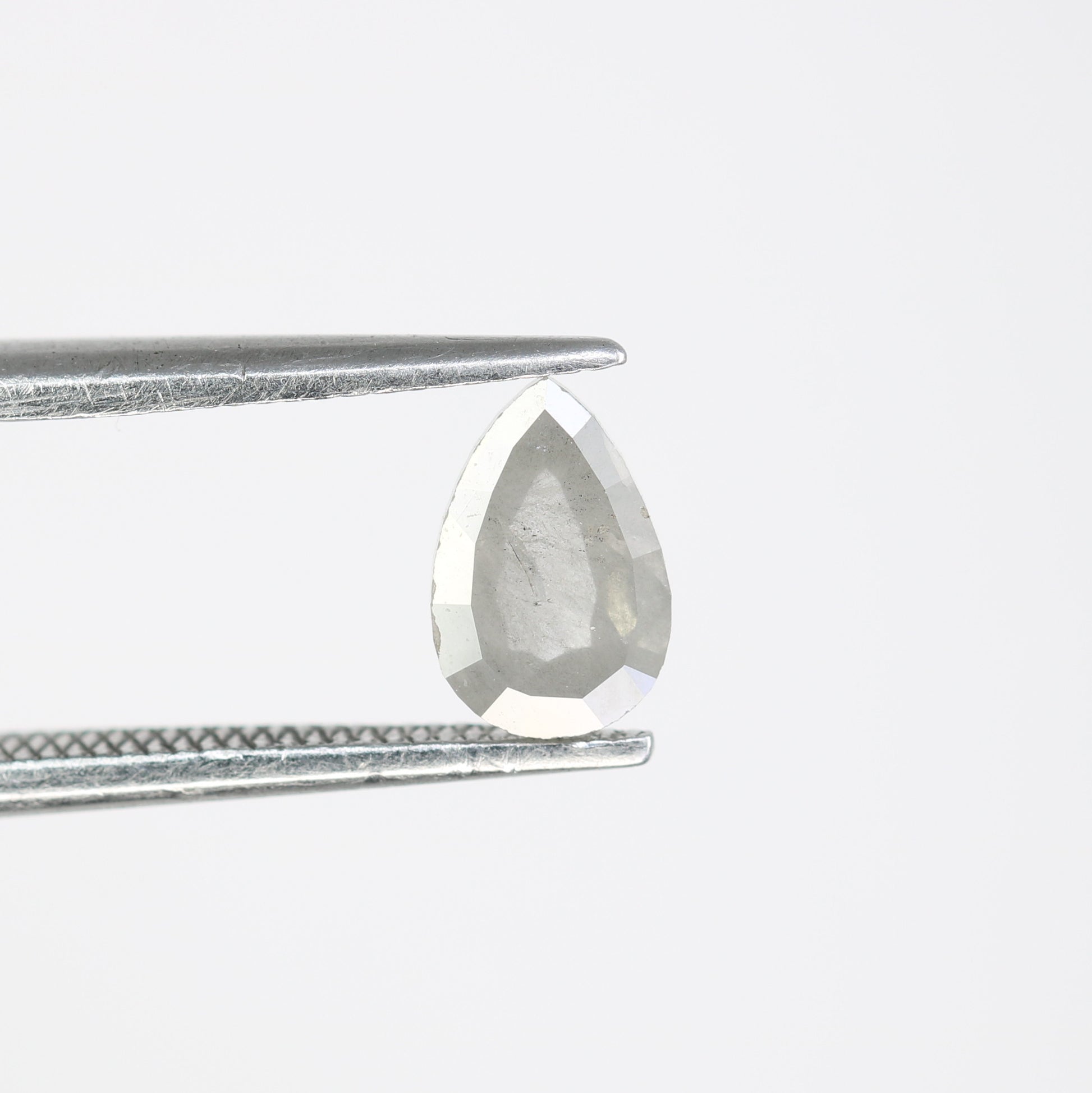 0.64 Carat Natural Loose Pear Shape Salt and Pepper Diamond for a Distinctive Wedding Ring: Elegant Gemstone Jewelry Piece - JayKrishna Diamond