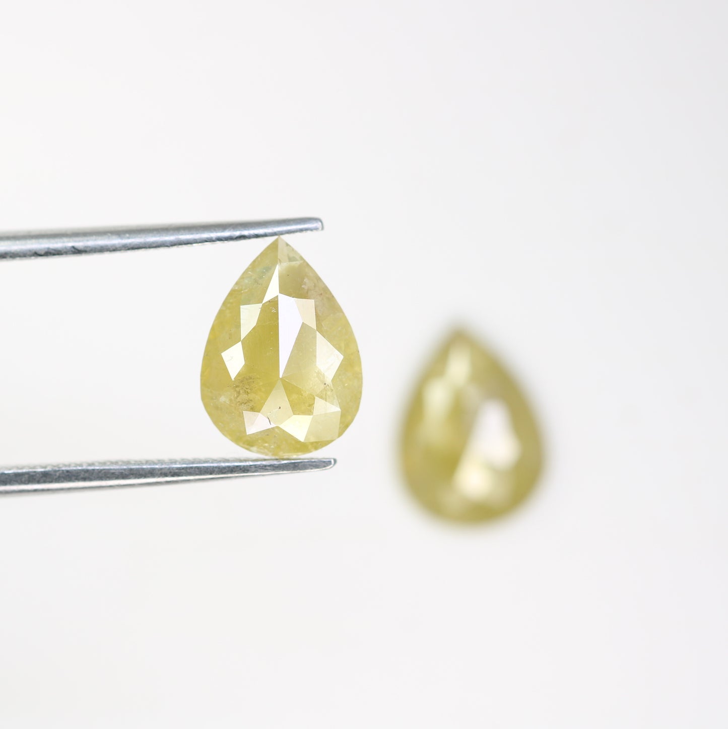 2.94 Carat Natural Yellow Rustic Diamond Pair Fancy Pear Shaped Diamond - JayKrishna Diamond