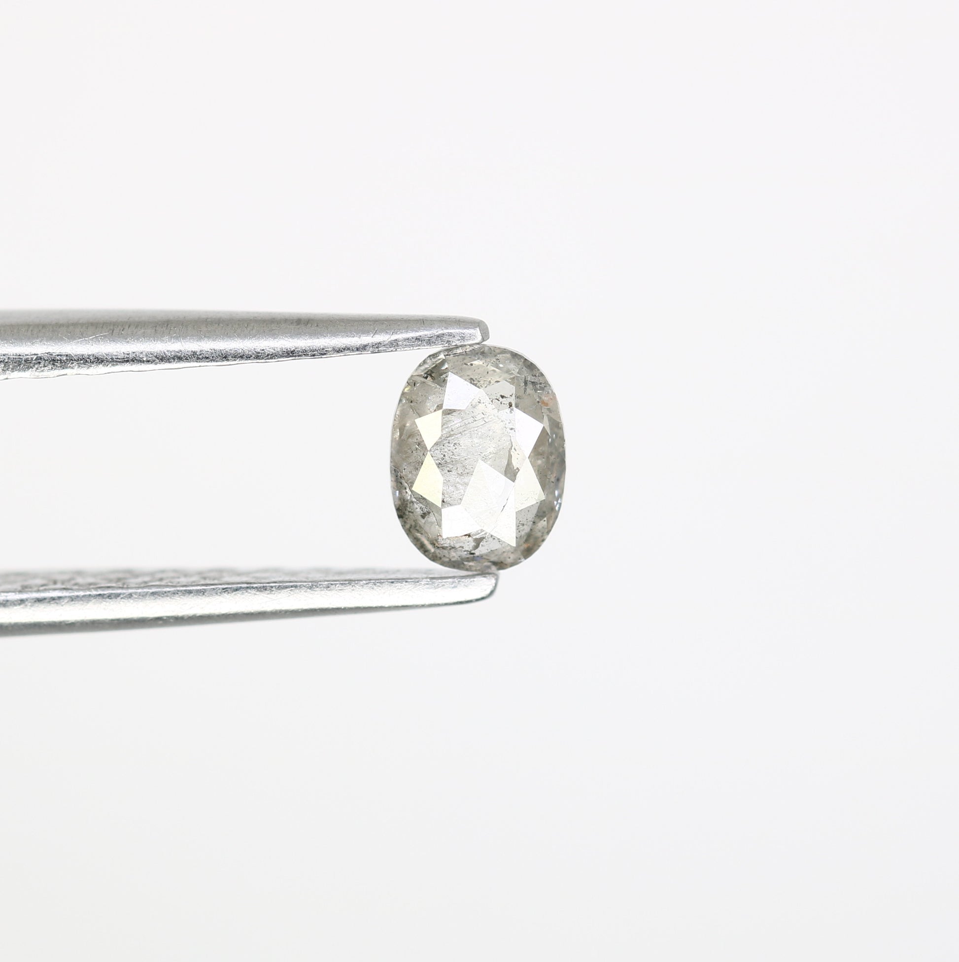 0.28 Carat Salt and Pepper Loose Oval Cut Diamond – Perfect for Galaxy Rings | Unique Salt and Pepper Oval Diamond - JayKrishna Diamond